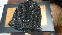 Stylish black knitted hat